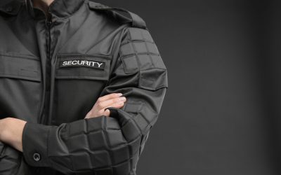 Male,Security,Guard,In,Uniform,On,Dark,Background,,Closeup
